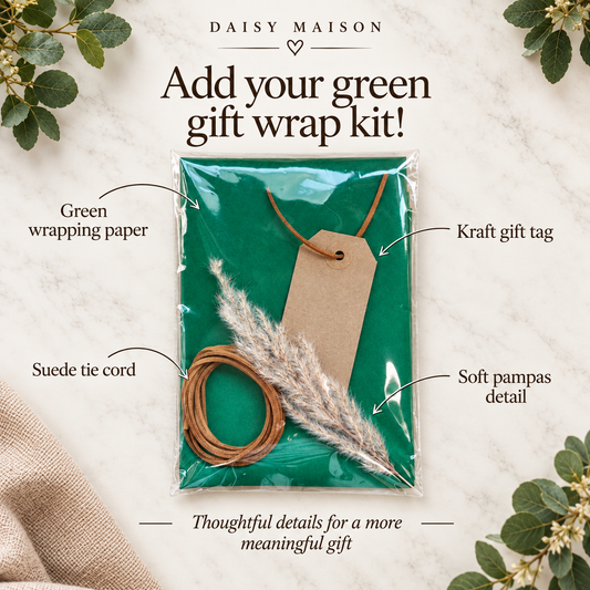 Daisy Maison green gift wrap kit with labelled green wrapping paper, tan tie cord, kraft gift tag and pampas detail.