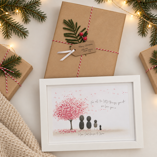 Personalised family and dog pebble artwork in an elegant Christmas gift setting