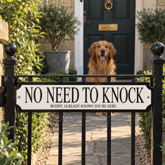 No need to knock personalised street sign on a garden gate, with Buddy the golden retriever by the front door