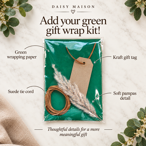 Daisy Maison green gift wrap kit with labelled green wrapping paper, tan tie cord, kraft gift tag and pampas detail.