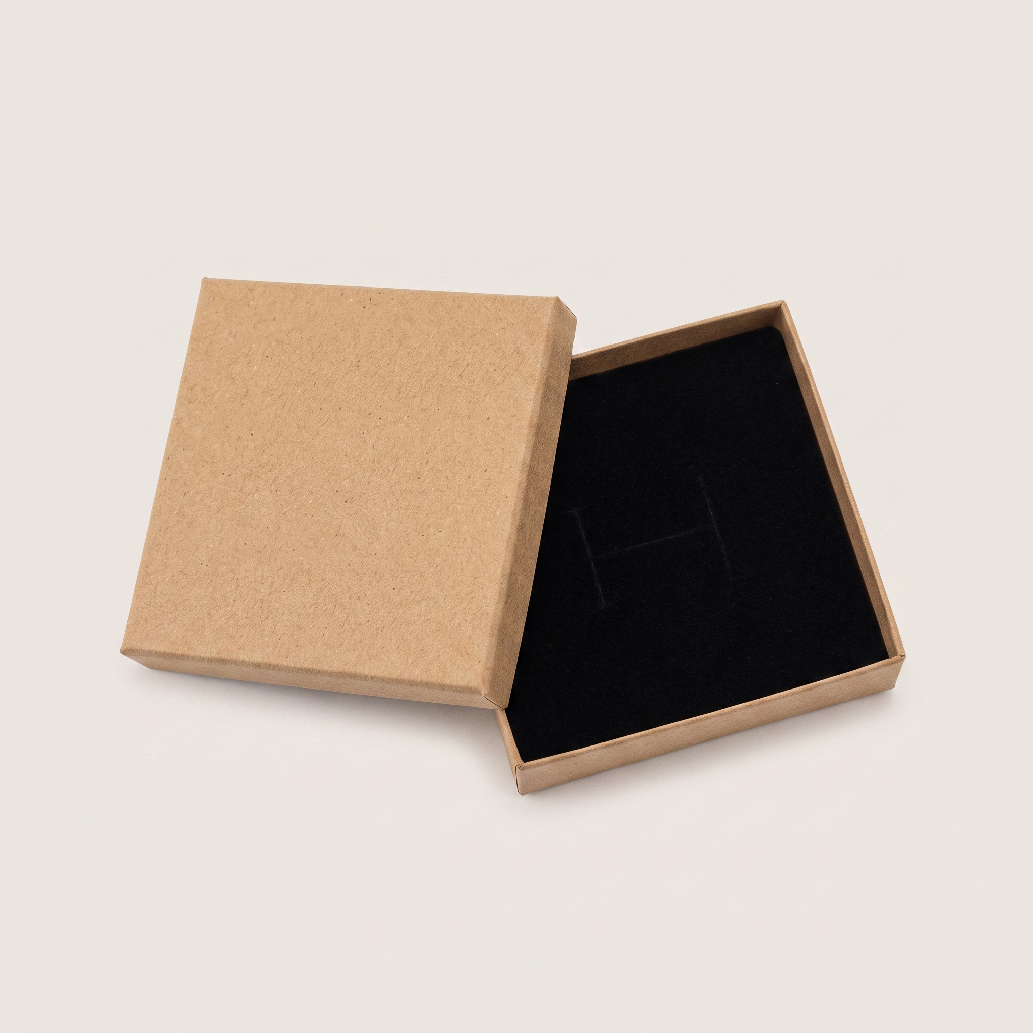 Small kraft brown Daisy Maison gift box, open with black insert