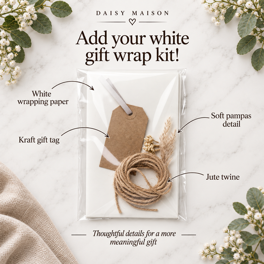 Daisy Maison white gift wrap kit with labelled white wrapping paper, kraft gift tag, soft pampas detail and jute twine.