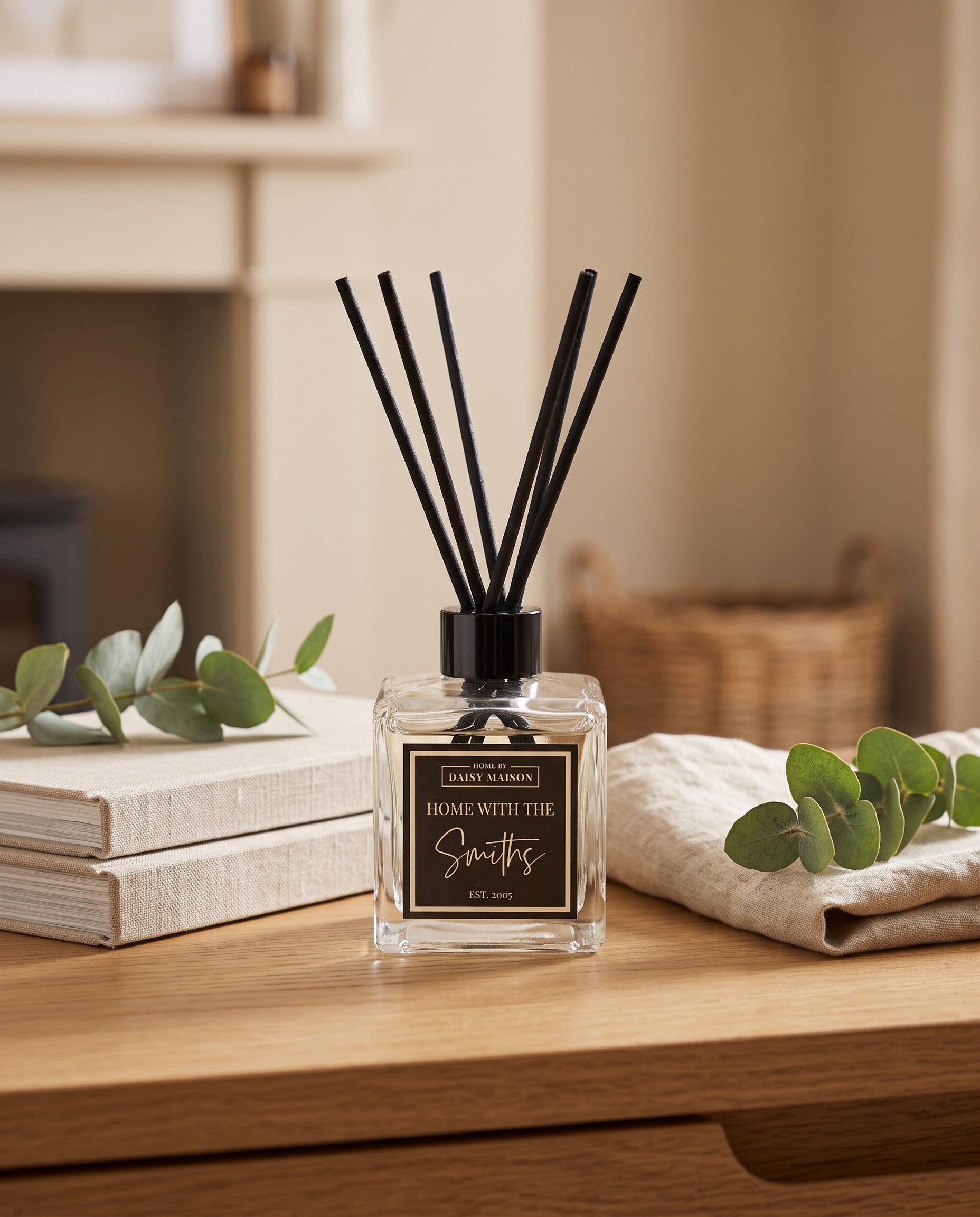 Personalised family reed diffuser styled on a hallway shelf