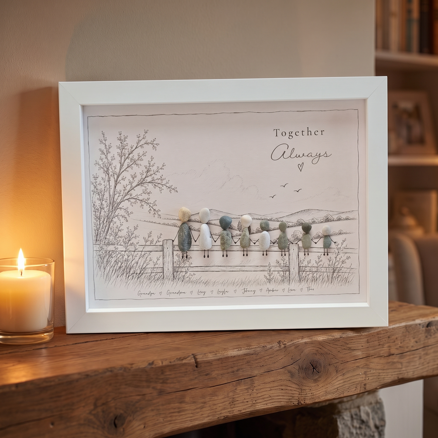 ‘Together Always’ personalised pebble picture in a white frame on an oak mantelpiece by candlelight