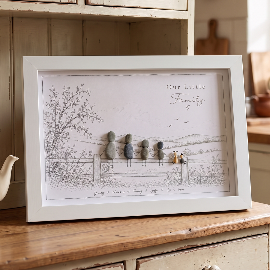 ‘Our Little Family’ personalised pebble picture in a white frame on a farmhouse kitchen dresser