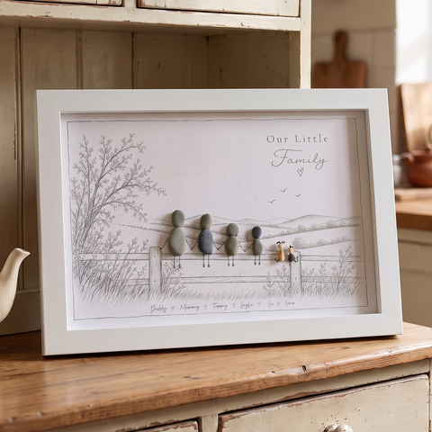 ‘Our Little Family’ personalised pebble picture in a white frame on a farmhouse kitchen dresser