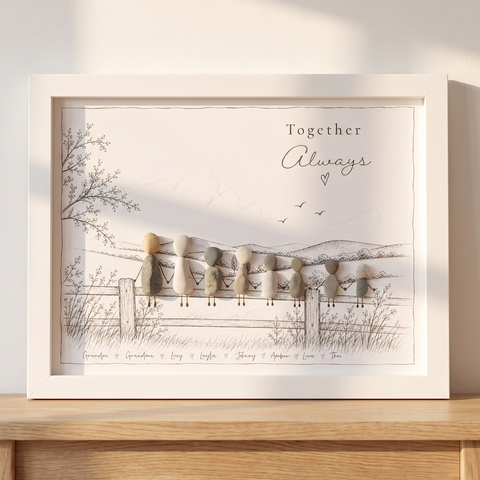 ‘Together Always’ pebble picture on a pale oak console against a sunlit white wall