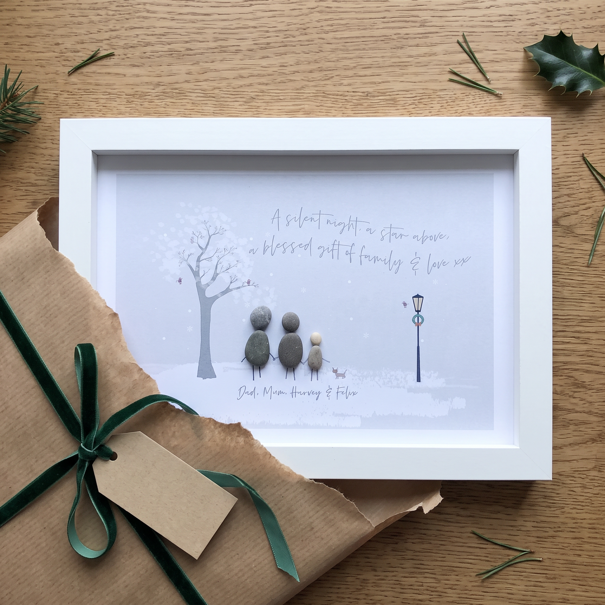 Family Festive pebble picture unwrapped on Christmas morning