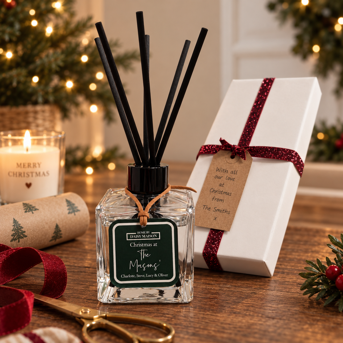 Personalised Christmas reed diffuser and gift box on a simple festive wrapping table